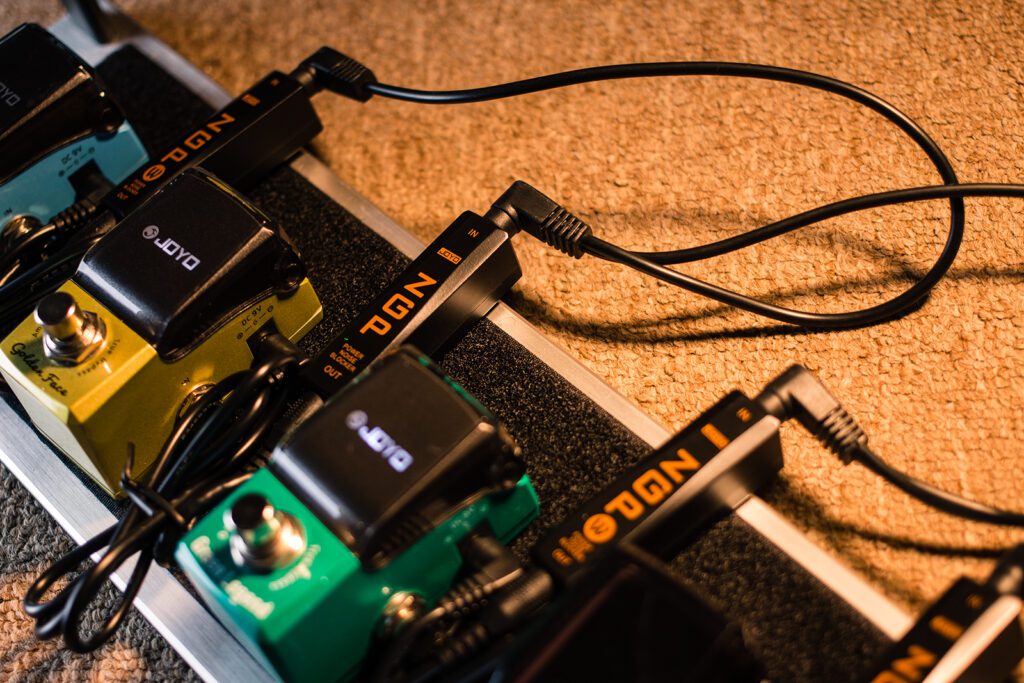 How to fix a noisy guitar set up