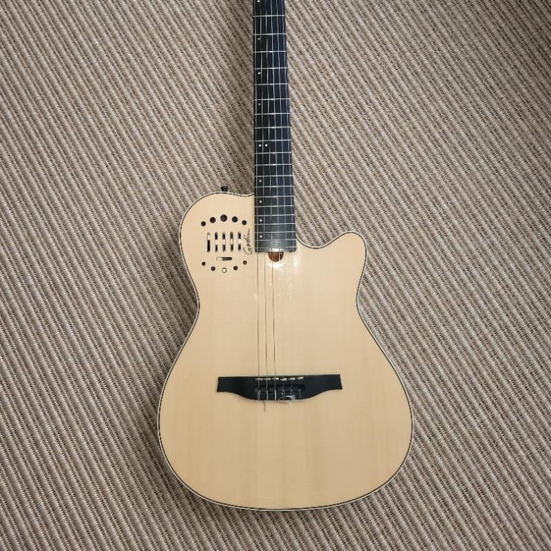 2023 - Present Godin Multiac Nylon Deluxe Natural - £1650 used Guitar