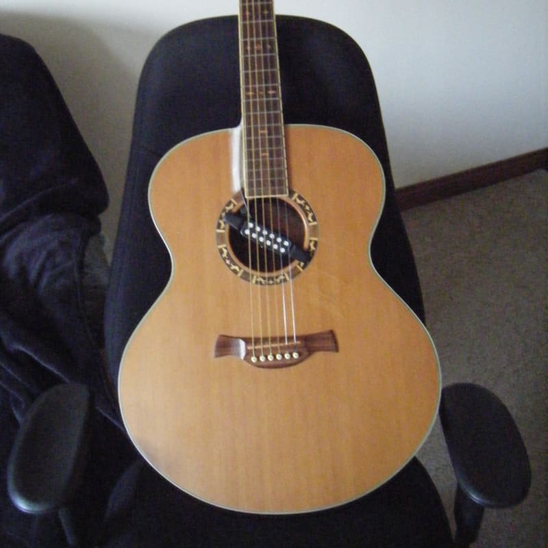 probably around 2004 Crafter J-15/N Wood - £175 used Guitar