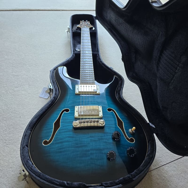 2020 - Present PRS SE Hollowbody II Piezo Peacock Blue - £825 used Guitar