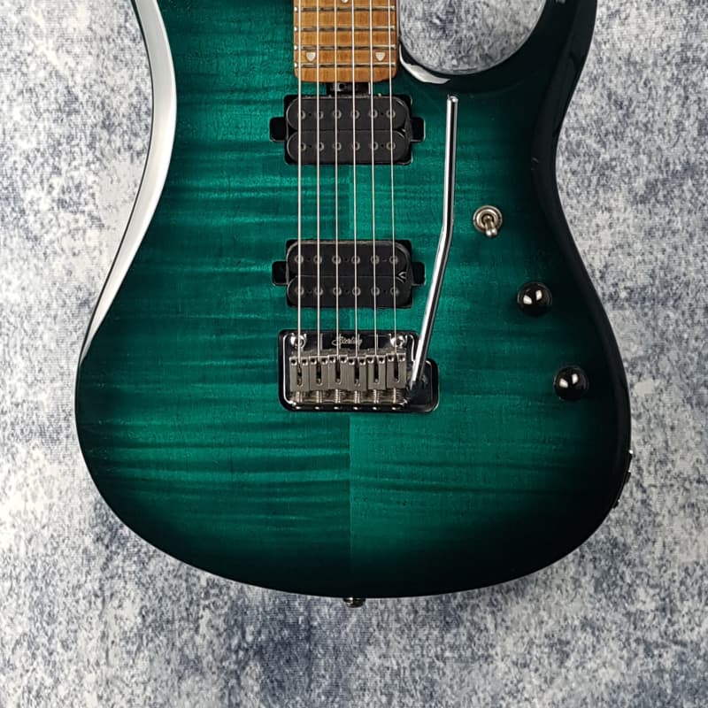 Stirling John Petrucci JP150 FM Teal – £739 used Guitar